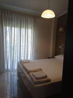 Postel nebo postele na pokoji v ubytování Deluxe Apartments 2