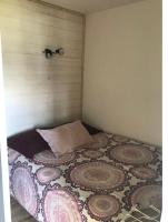 Łóżko lub łóżka w pokoju w obiekcie Appartement 4pers rénové aux Menuires