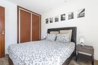Postel nebo postele na pokoji v ubytování Home2Book Cozy Apartment Playa del Inglés, Pool