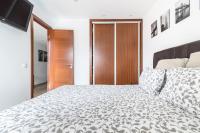 Postel nebo postele na pokoji v ubytování Home2Book Cozy Apartment Playa del Inglés, Pool
