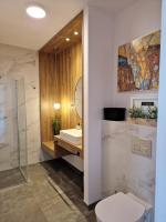 Koupelna v ubytování Apartamenty Szafirowe w Mielnie