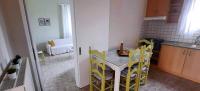 A kitchen or kitchenette at Arigos Apartments