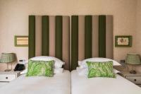 A bed or beds in a room at Vmaison Brera Milano