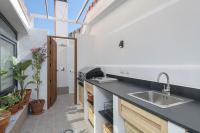 A kitchen or kitchenette at Chinchilla Apartment in Malaga by Solaga Holiday Homes