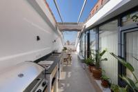 A balcony or terrace at Chinchilla Apartment in Malaga by Solaga Holiday Homes