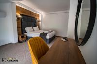 Postel nebo postele na pokoji v ubytování Hotel Kirkovo