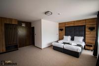 Postel nebo postele na pokoji v ubytování Hotel Kirkovo