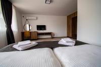 Postel nebo postele na pokoji v ubytování Hotel Kirkovo