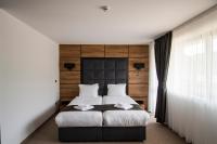 Postel nebo postele na pokoji v ubytování Hotel Kirkovo