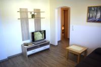 Televízia a/alebo spoločenská miestnosť v ubytovaní Ferienwohnung Seethaler - Gartenblick