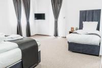 Postel nebo postele na pokoji v ubytování Hotel Kirkovo