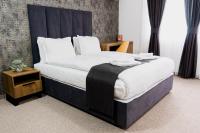 Postel nebo postele na pokoji v ubytování Hotel Kirkovo