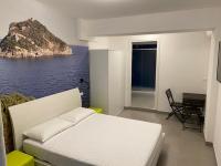 Posteľ alebo postele v izbe v ubytovaní Torre del mare Rooms