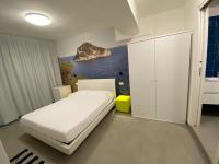 Posteľ alebo postele v izbe v ubytovaní Torre del mare Rooms