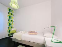 A bed or beds in a room at CRUdiS Luxury rooms
