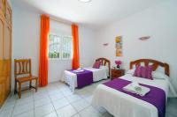 Postel nebo postele na pokoji v ubytování Villa Ciruela by Villa Plus