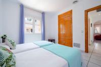 Postel nebo postele na pokoji v ubytování Villa Ciruela by Villa Plus