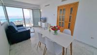 Posedenie v ubytovaní Planta 21 Apartamento con terraza privada y vistas al mar