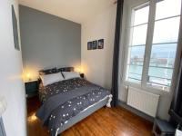 Posteľ alebo postele v izbe v ubytovaní "L'amarrage" 2 chambres Perret Pleine Vue Mer