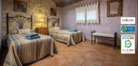 Postel nebo postele na pokoji v ubytování Abaric Casa Rural