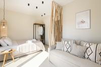 Posteľ alebo postele v izbe v ubytovaní Palm Residences