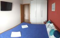 Posteľ alebo postele v izbe v ubytovaní Apartment Rubin
