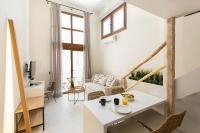 Televízia a/alebo spoločenská miestnosť v ubytovaní Palm Residences