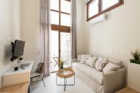 Televízia a/alebo spoločenská miestnosť v ubytovaní Palm Residences