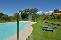 The swimming pool at or close to Villa Nocciola Il Poderone