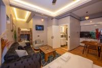 TV a/nebo společenská místnost v ubytování Dorne Suite Taksim Hotel