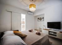 Posteľ alebo postele v izbe v ubytovaní Sea Front Apartments Ivana