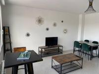 Televízia a/alebo spoločenská miestnosť v ubytovaní Superbe appartement avec vue panoramique sur Mers