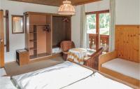 Posteľ alebo postele v izbe v ubytovaní Ferienhaus Mit Eigener Sauna