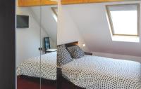 Postel nebo postele na pokoji v ubytov&aacute;n&iacute; Vijverdorp - Type Waterlelie