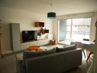 Televízia a/alebo spoločenská miestnosť v ubytovaní Appartement Tout Confort à Arzon - Proche Plage du Fogeo, Commerces et Activités - FR-1-639-30