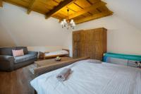 Postel nebo postele na pokoji v ubytování Drevenica Tale - Pool Table - Jacuzzi - Sauna - Small teambuilding - Hotel Partizán 5 min