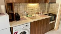 Kuchyňa alebo kuchynka v ubytovaní Paralia Pefkohori apartments