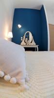 A bed or beds in a room at Villa Miranda