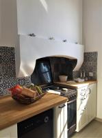 A kitchen or kitchenette at Villa Miranda