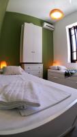 A bed or beds in a room at Villa Miranda
