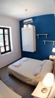 A bed or beds in a room at Villa Miranda