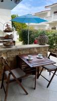 Patio alebo iná vonkajšia časť ubytovania Paralia Pefkohori apartments