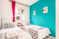 Posteľ alebo postele v izbe v ubytovaní Villa Acuario by Villa Plus