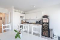 Kuchyňa alebo kuchynka v ubytovaní À portée de mer. Appt 70m2, 2ch+parking