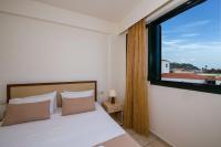 Postel nebo postele na pokoji v ubytování Margarita Beach Hotel