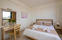 Postel nebo postele na pokoji v ubytování Margarita Beach Hotel