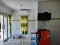 TV a/nebo společenská místnost v ubytování สิชล บ้านอุ๊ รีสอร์ท