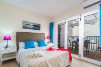 A bed or beds in a room at Villa Buena Vista by Villa Plus