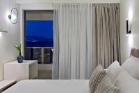Postel nebo postele na pokoji v ubytování KoSea Boutique Hotel