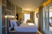 Postel nebo postele na pokoji v ubytování KoSea Boutique Hotel
